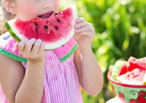 kid eating watermelon